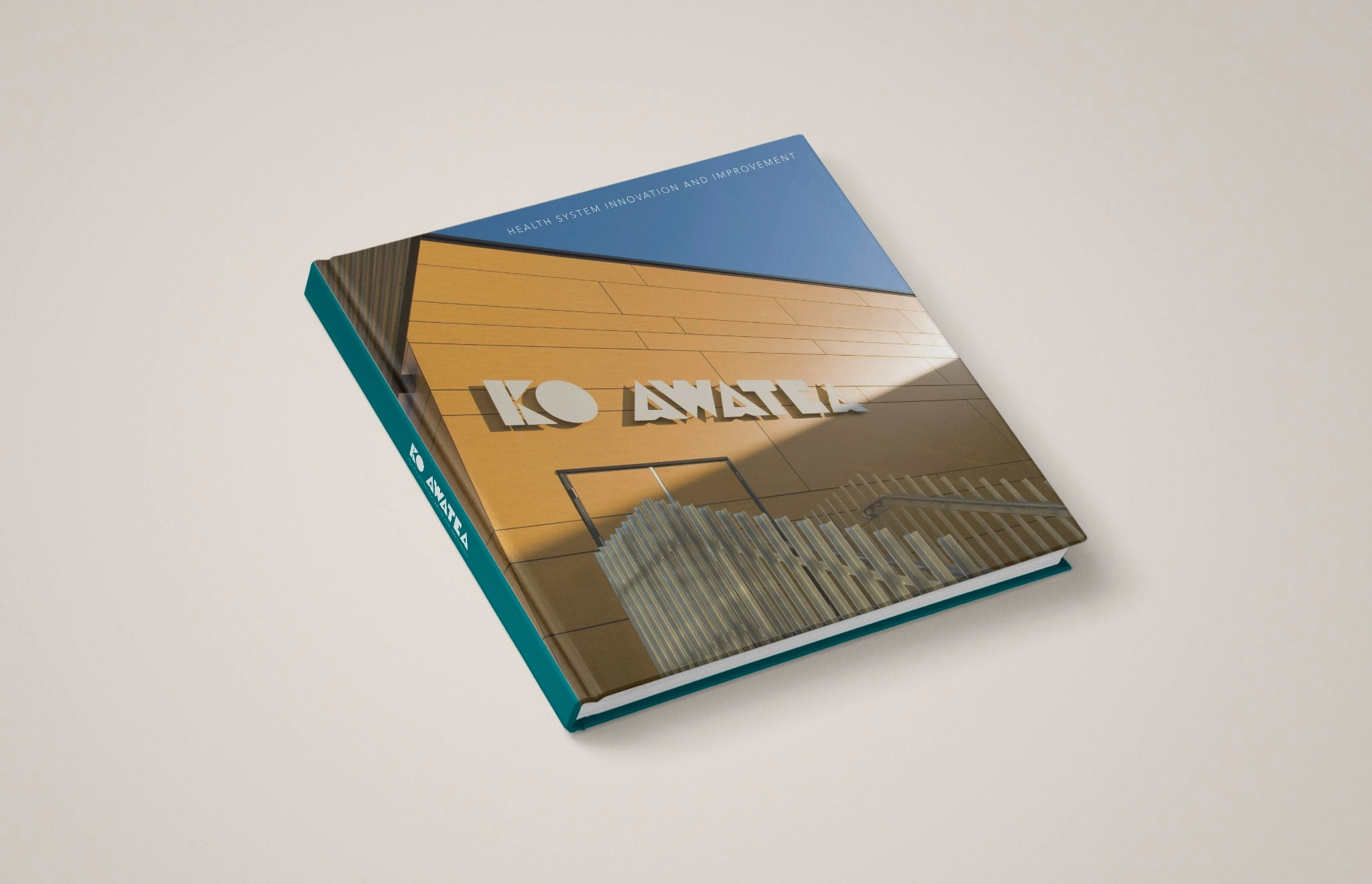 Ko Awatea publication cover featuring the building facade and teal spine