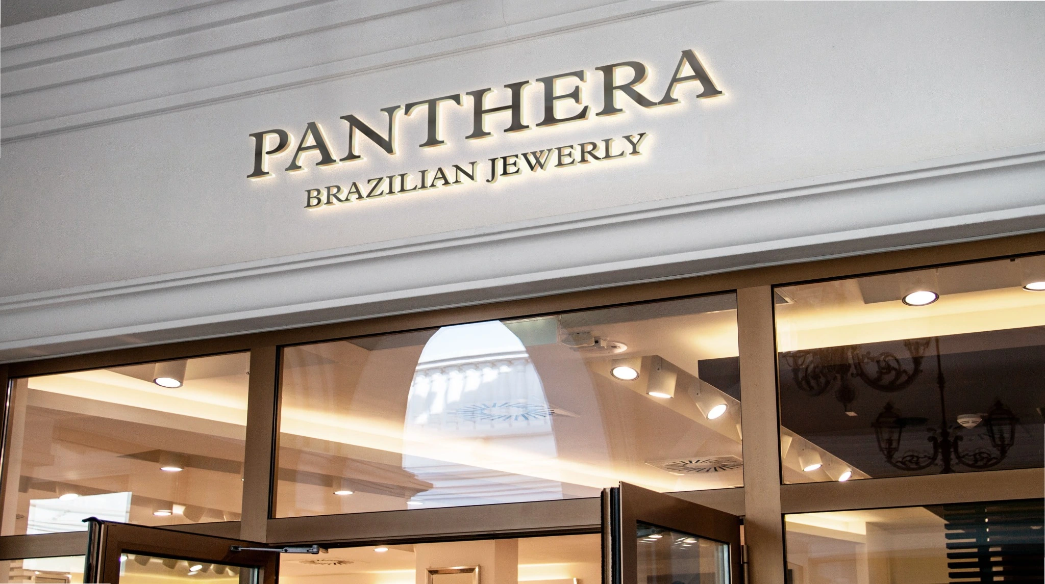Panthera Brazilian Jewelry wordmark shown in a storefront signage mockup