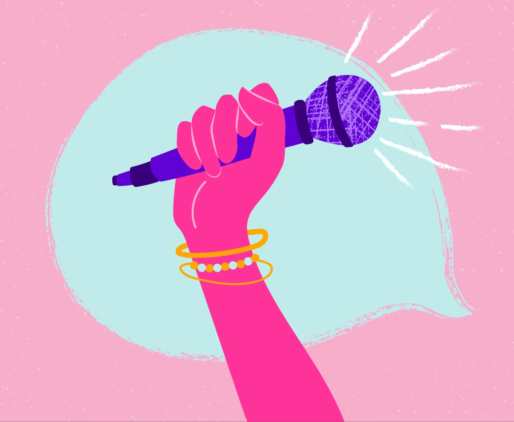 A raised hand holding a microphone